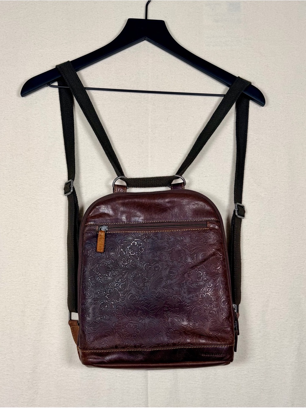 Jack Georges Voyager Convertible Backpack with embossed floral buffalo leather